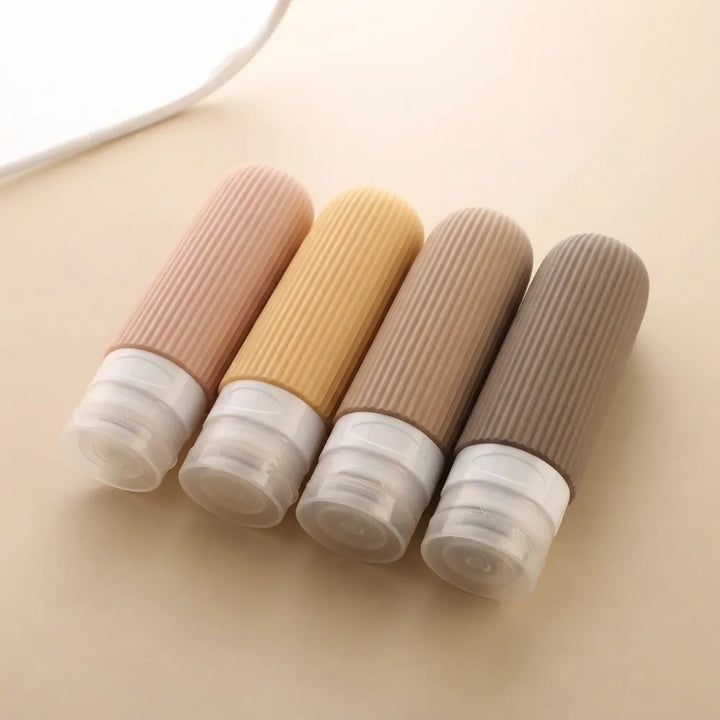 4PCS Travel Toiletry Bottles Set | 90ml BPA-Free Leakproof Silicone Containers for Shampoo, Lotion & Travel Essentials